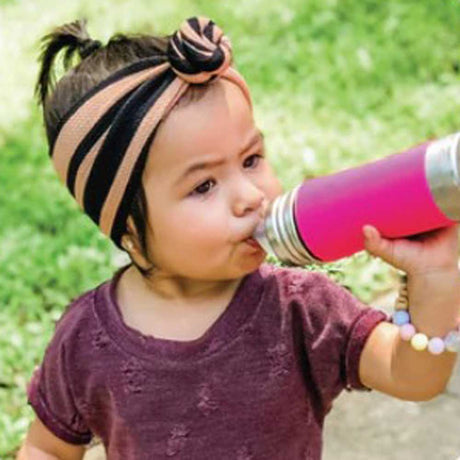 Child with a stainless steel bottle